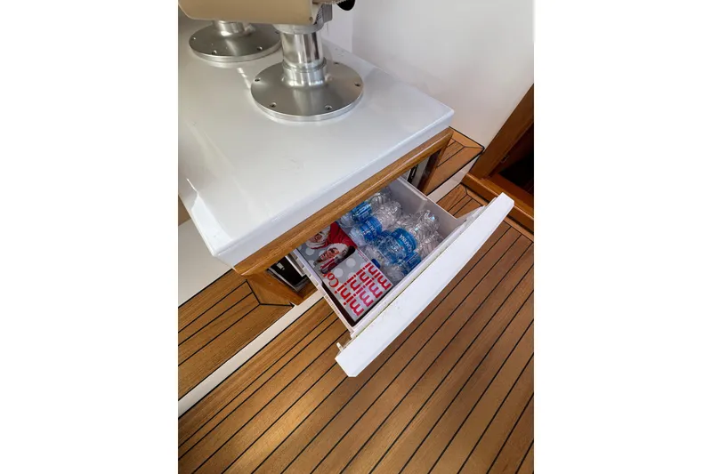Slide: The Image of Open drawer on San Juan 41 yacht with water bottles and snacks, 2014 model. - 29