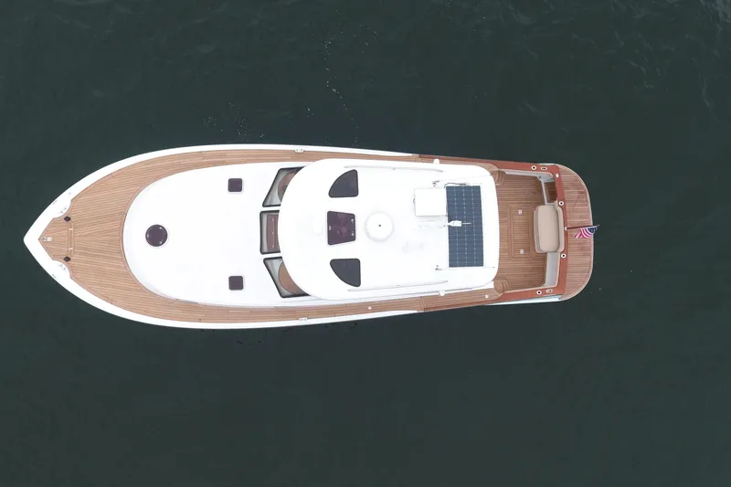 Slide: The Image of Overhead view of 2014 San Juan 41 yacht on calm water. - 5