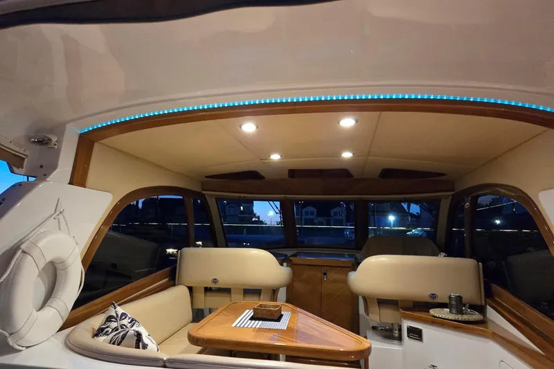 Slide: The Image of Luxurious interior of 2014 San Juan 41 yacht with elegant seating and ambient lighting. - 54