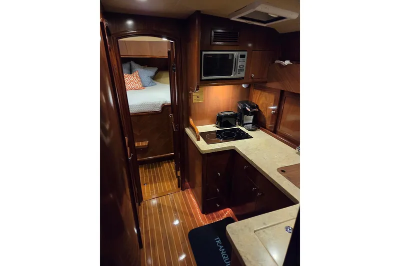 Slide: The Image of Luxurious interior of 2014 San Juan 41 yacht with modern kitchen and cozy bedroom. - 55