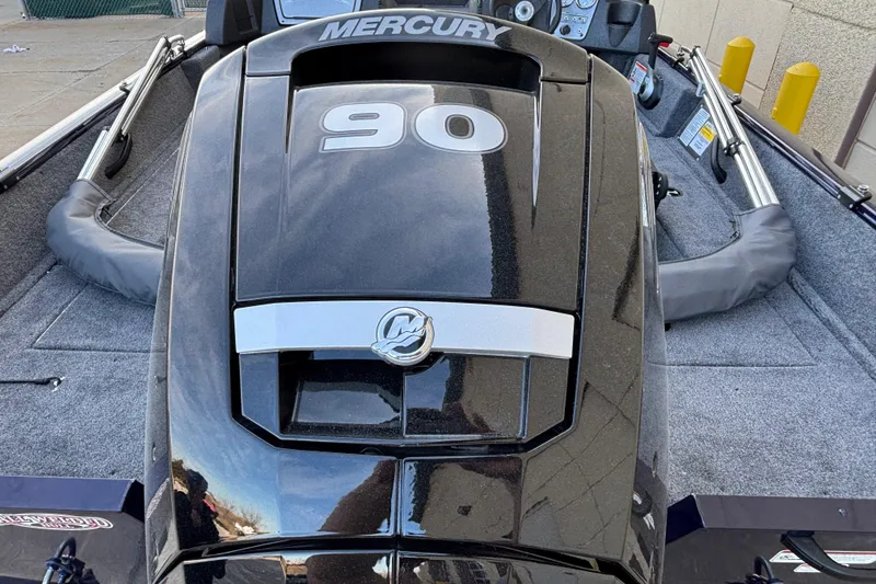 Slide: The Image of 2026 Tracker Pro Guide V-16 WT boat with Mercury 90 engine, rear view. - 46