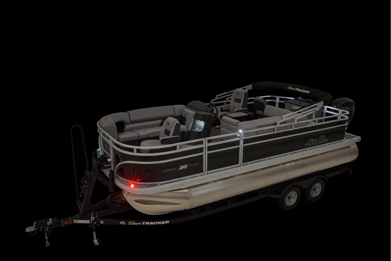 Slide: The Image of 2026 Sun Tracker SportFish 20 DLX pontoon boat, close-up view of front design. - 17