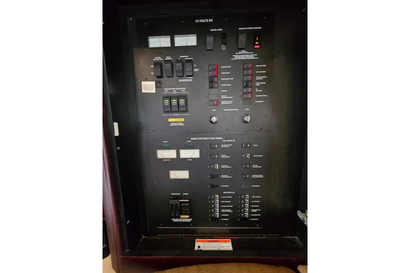 Slide: The Image of Luxurious interior of 2007 Sea Ray 52 Sedan Bridge with leather seating and wood accents. - 28