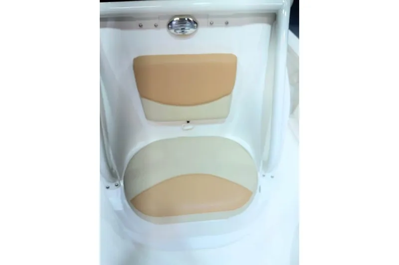 Slide: The Image of 2023 NauticStar 227 XTS boat seat with beige and cream cushions. - 6