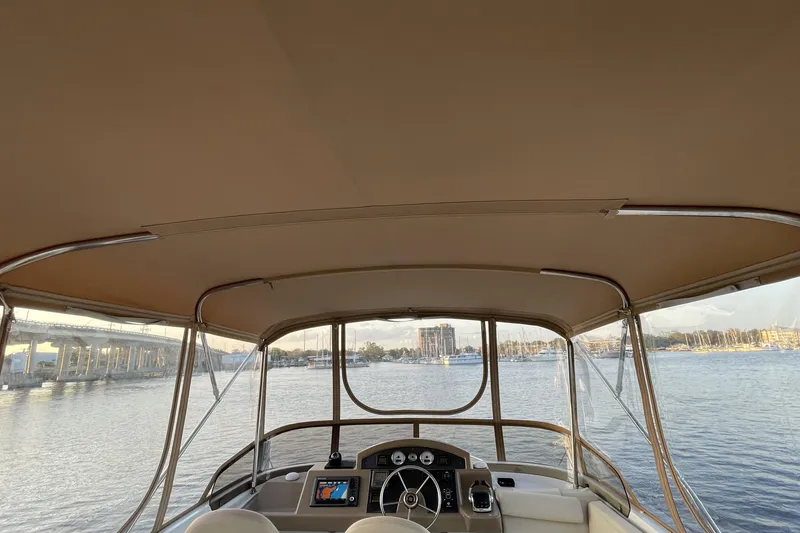 Slide: The Image of Interior view of 2013 Beneteau Swift Trawler 44 overlooking the water. - 46