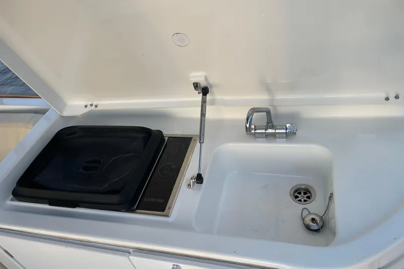 Slide: The Image of Outdoor sink and grill on 2013 Beneteau Swift Trawler 44 yacht. - 59
