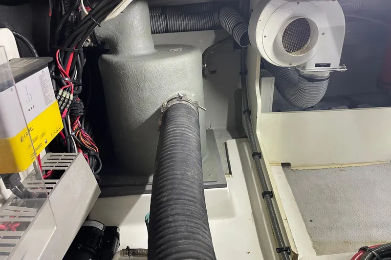 Slide: The Image of Engine room of 2013 Beneteau Swift Trawler 44 with wiring and ventilation system. - 64