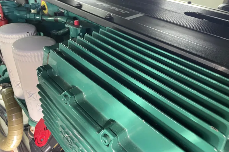 Slide: The Image of Engine compartment of a 2013 Beneteau Swift Trawler 44, showcasing detailed components. - 69