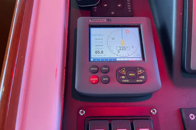 Slide: The Image of Raymarine ST70 display on 2013 Beneteau Swift Trawler 44, showing navigation data. - 73