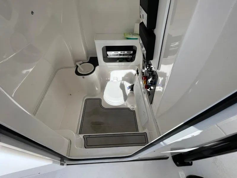 Slide: The Image of 2024 Sea Fox 288 Commander boat interior with modern amenities and sleek design. - 16