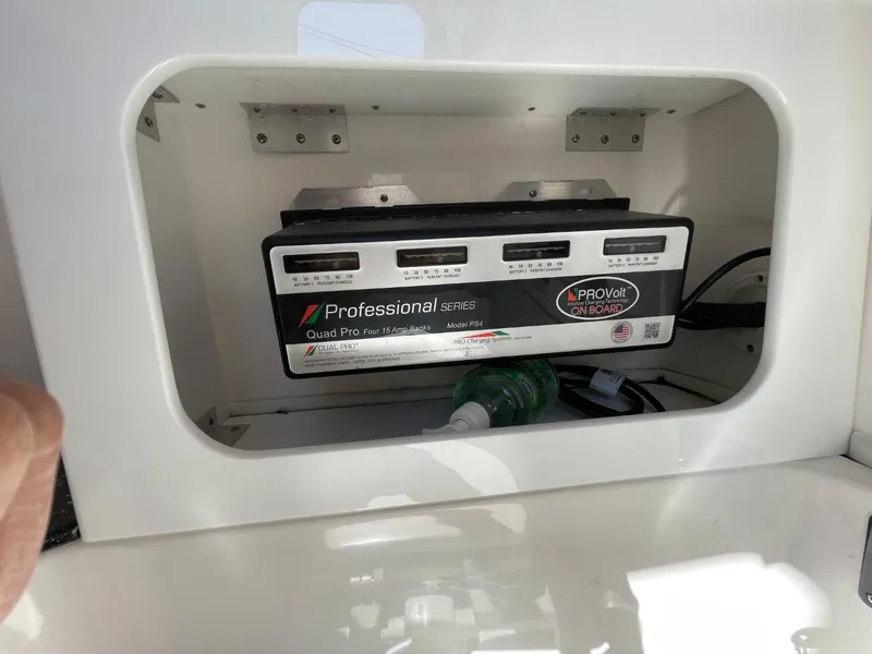 Slide: The Image of Battery charger in 2024 Sea Fox 288 Commander boat compartment. - 19