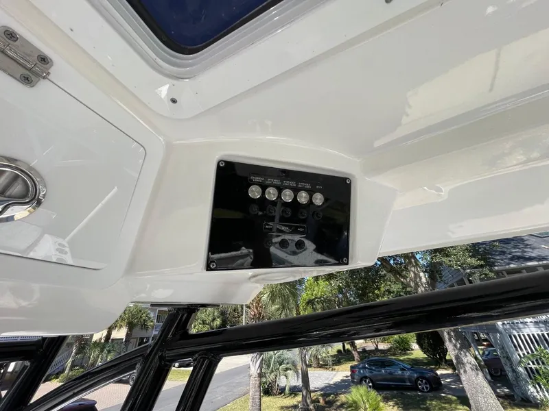 Slide: The Image of 2024 Sea Fox 288 Commander boat interior with control panel and overhead view. - 30