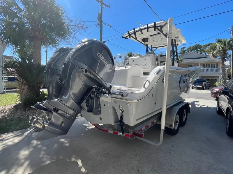 Slide: The Image of 2024 Sea Fox 288 Commander boat with dual Yamaha engines on a trailer. - 7