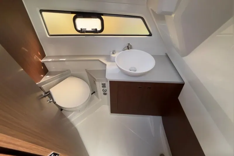 Slide: The Image of Modern bathroom interior of 2026 Beneteau Antares 9 V2 boat, featuring sleek design and compact layout. - 16