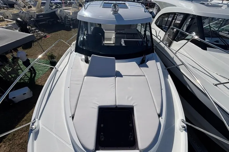 Slide: The Image of 2026 Beneteau Antares 9 V2 boat with spacious deck and sleek design. - 18