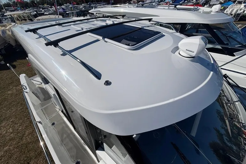 Slide: The Image of 2026 Beneteau Antares 9 V2 boat roof with sleek design and modern equipment. - 19