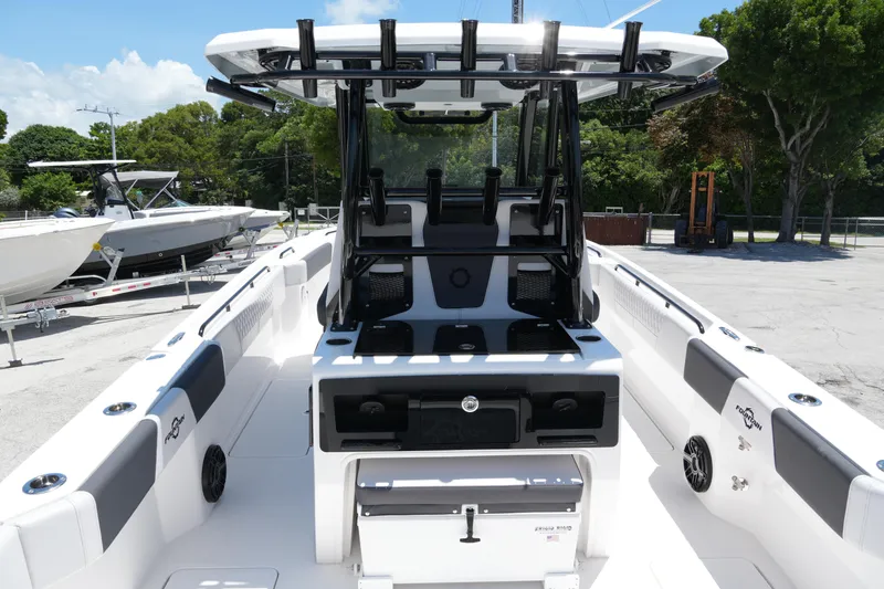 Slide: The Image of 2025 Fountain 32 NX Sportfish boat, sleek design, spacious deck, and modern features. - 12
