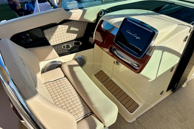 Slide: The Image of 2026 Chris-Craft Launch 31 GT interior with luxurious seating and modern dashboard. - 15