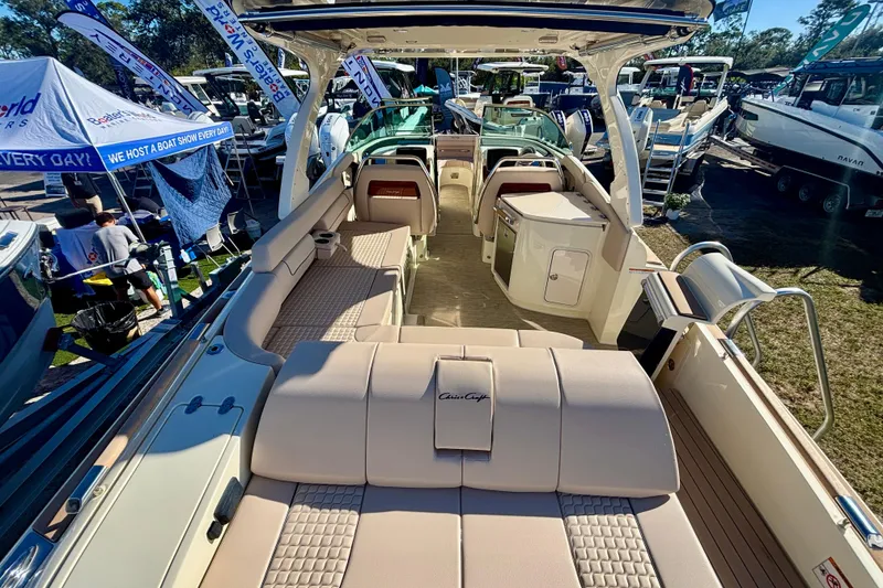 Slide: The Image of 2026 Chris-Craft Launch 31 GT luxury boat interior at outdoor boat show. - 5