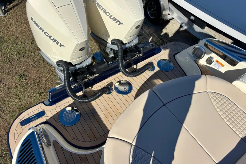 Slide: The Image of 2026 Chris-Craft Launch 31 GT boat with dual Mercury engines and luxurious deck design. - 7