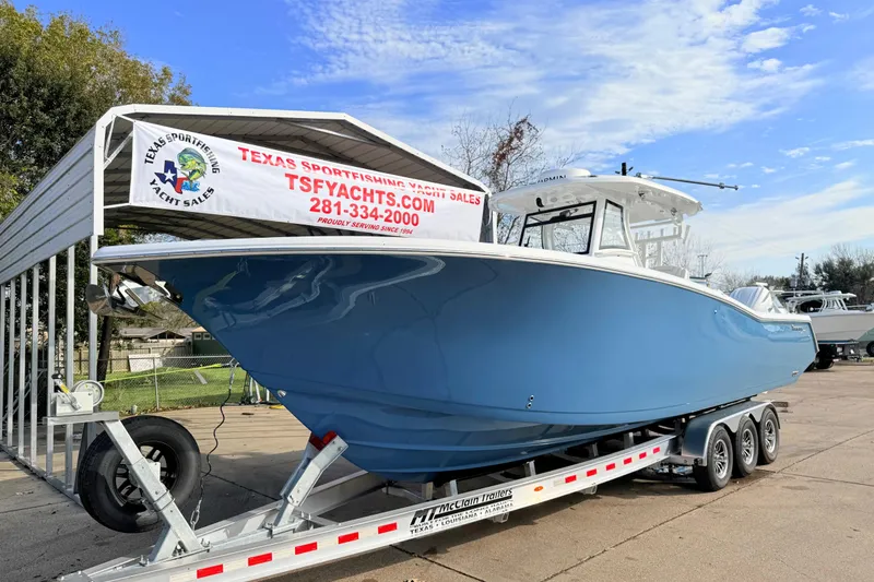 The Image of 2026 Tidewater 320 CC Adventure boat on trailer at Texas Sportfishing Yacht Sales. - 0