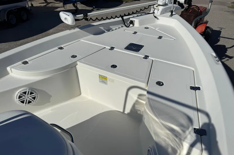 Slide: The Image of 2015 NauticStar 1910 NauticBay boat deck with storage compartments and speaker. - 8