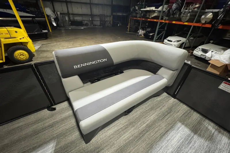 Slide: The Image of 2026 Bennington 20SL boat seat in a warehouse setting. - 13