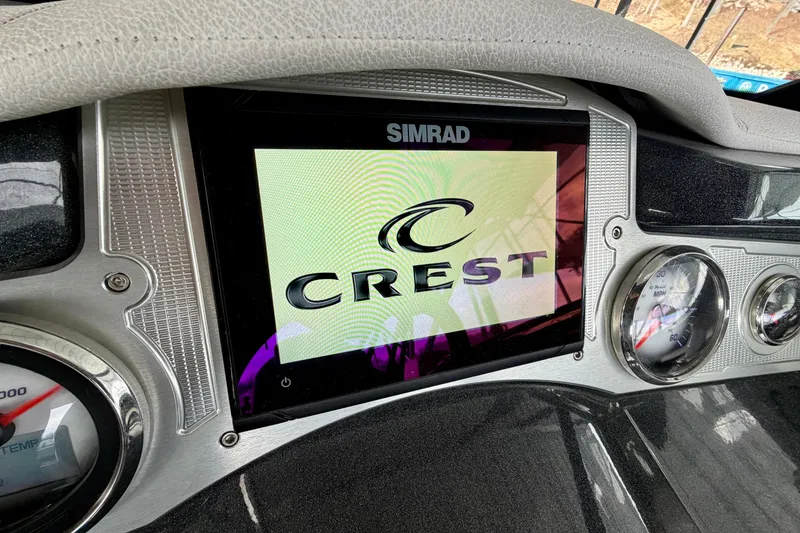 Slide: The Image of Simrad display on 2019 Crest Continental 250 SLS dashboard with gauges. - 20