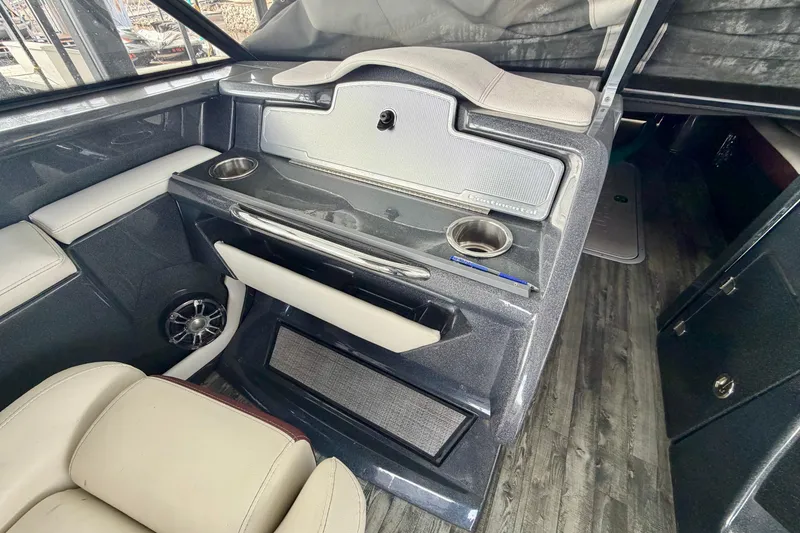 Slide: The Image of Interior of 2019 Crest Continental 250 SLS boat with luxurious seating and modern controls. - 27