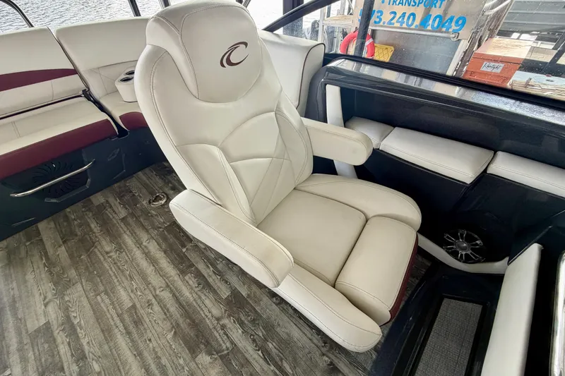 Slide: The Image of Interior of a 2019 Crest Continental 250 SLS boat with seating and cup holders. - 28