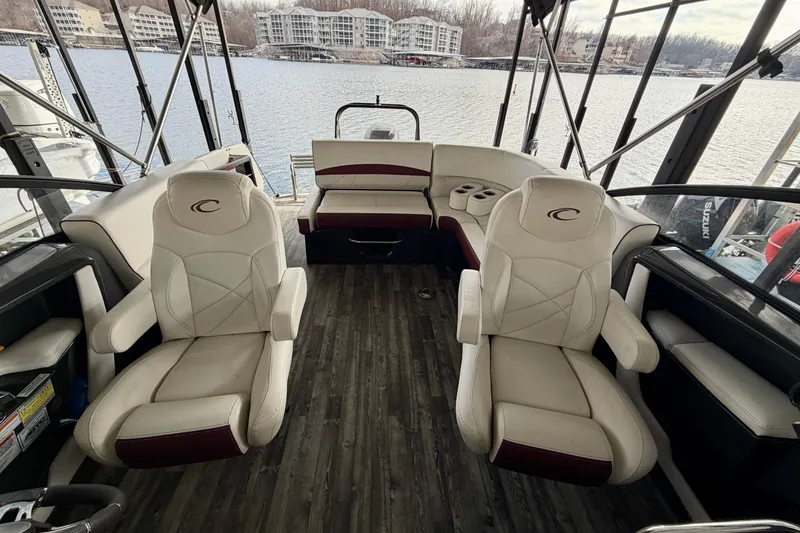 Slide: The Image of Luxurious interior of 2019 Crest Continental 250 SLS boat with plush seating. - 29