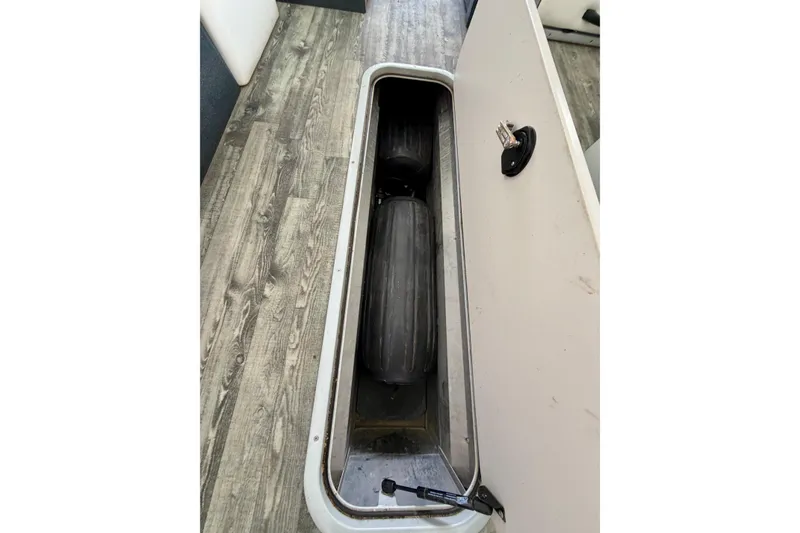 Slide: The Image of Interior of a 2019 Crest Continental 250 SLS boat with seating and steering wheel. - 36