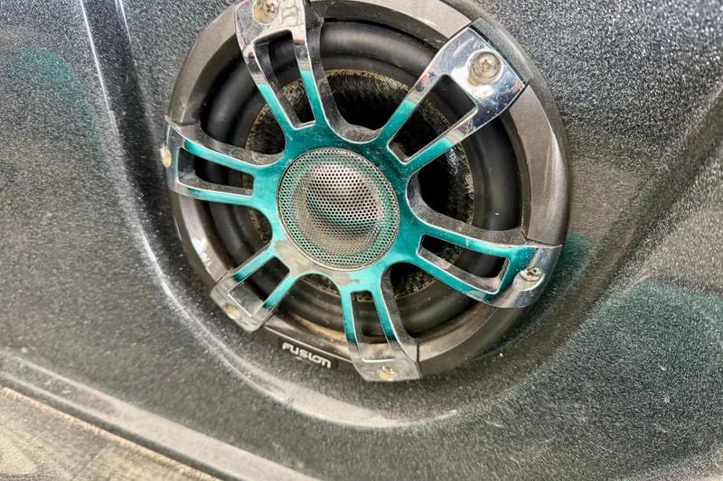 Slide: The Image of 2019 Crest Continental 250 SLS interior with covered console and seating. - 38