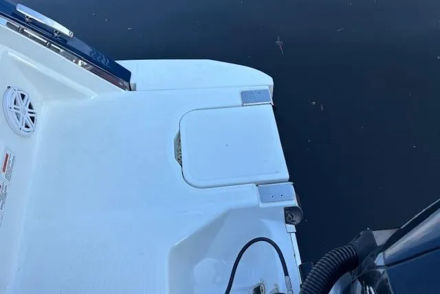 Slide: The Image of 2021 Cobalt R6 Outboard boat stern platform with water backdrop. - 12