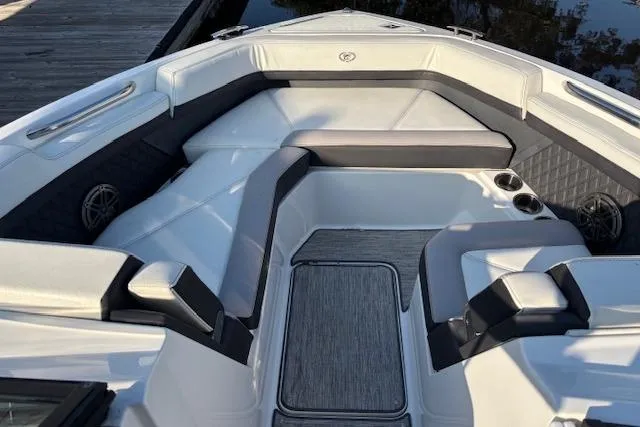 Slide: The Image of 2021 Cobalt R6 Outboard boat interior with luxurious seating and cup holders. - 21