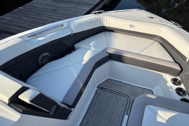 Slide: The Image of 2021 Cobalt R6 Outboard boat interior with white and gray seating. - 24