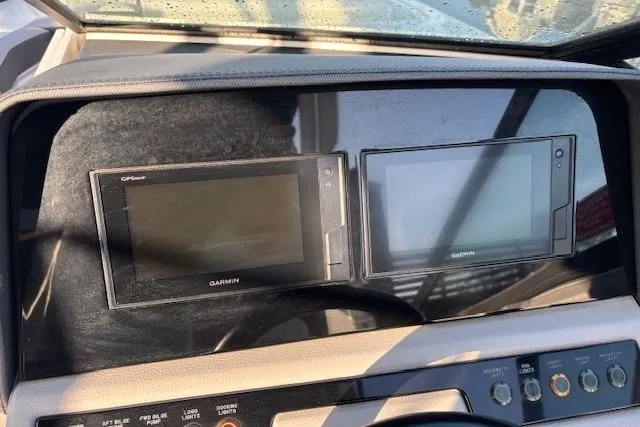 Slide: The Image of Dashboard of 2021 Cobalt R6 Outboard with dual Garmin displays. - 32