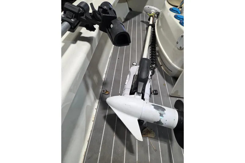 Slide: The Image of Trolling motor on 2010 Mako 18 LTS boat deck with rod holder. - 5