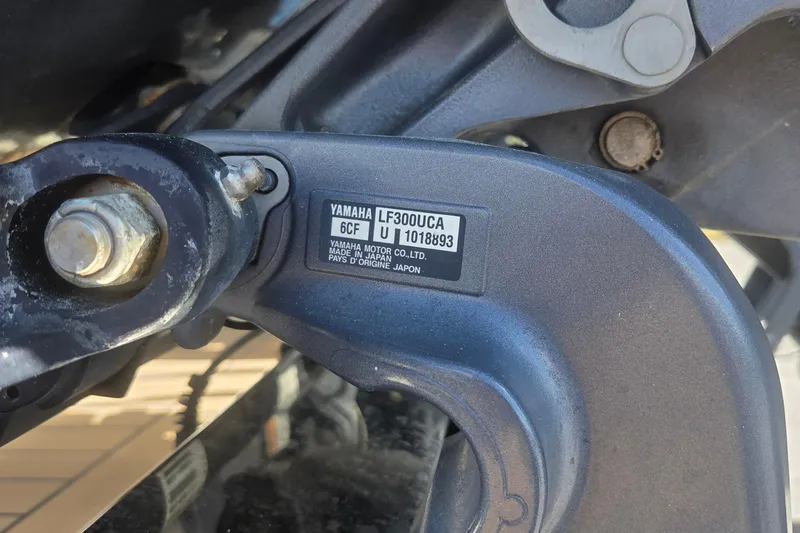 Slide: The Image of Close-up of Yamaha motor part on 2021 Scout 305 LXF boat. - 22