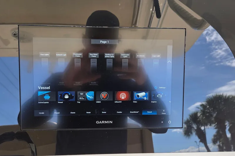 Slide: The Image of Garmin display on 2021 Scout 305 LXF boat, showing vessel controls and settings. - 29