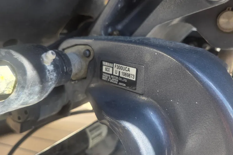 Slide: The Image of Close-up of Yamaha F300UCA engine part on 2021 Scout 305 LXF boat. - 34