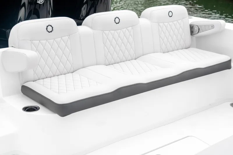 Slide: The Image of 2025 Fountain 38 Center Console boat with luxurious white quilted seating. - 6