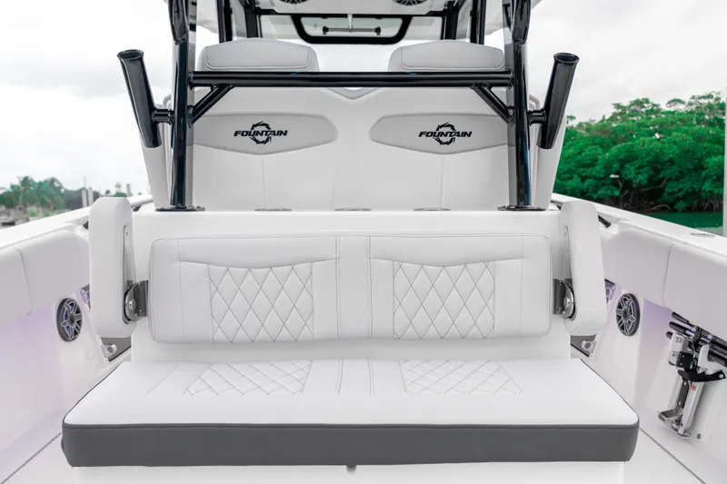 Slide: The Image of 2025 Fountain 38 Center Console boat interior with white seating and sleek design. - 8