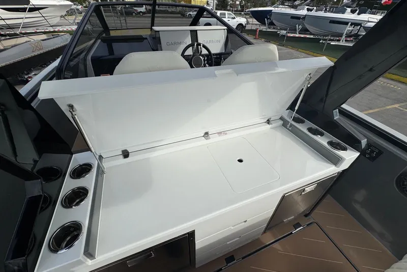 Slide: The Image of 2026 Virtue V10 boat with Mercury engines on calm water. - 11