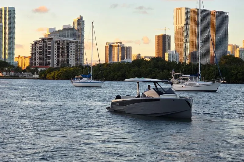 Slide: The Image of 2026 Virtue V10 luxury yacht on display under a clear blue sky. - 21