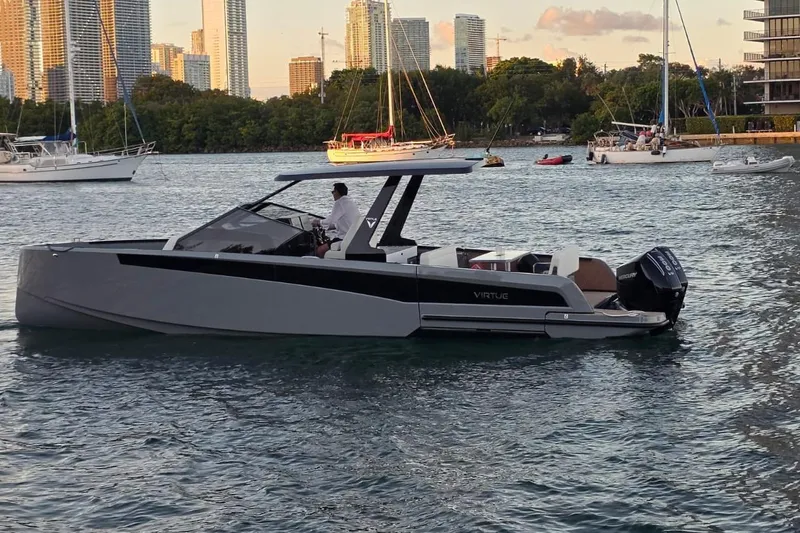 Slide: The Image of Modern Virtue V10 boat cruising near city skyline, 2026 model. - 24