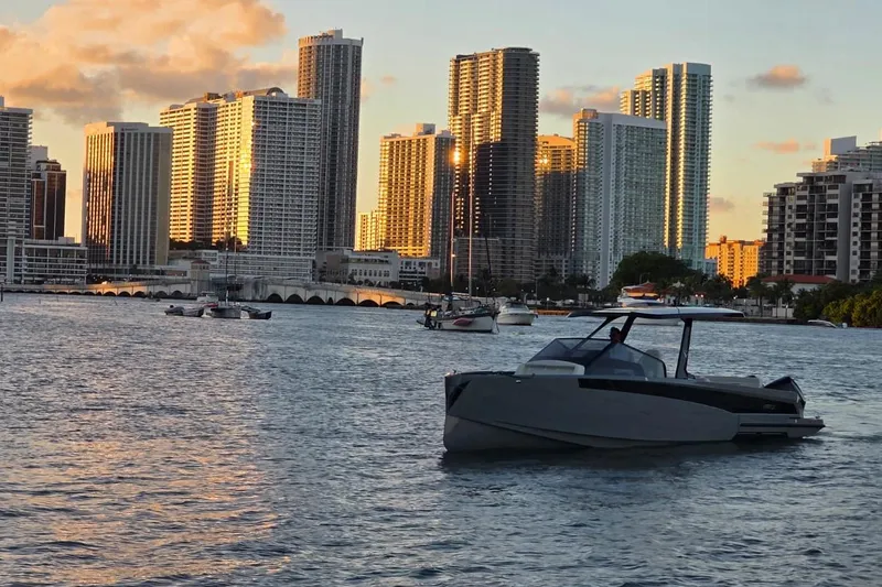 Slide: The Image of Open deck area of 2026 Virtue V10 boat with modern amenities and seating. - 31