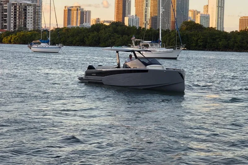 Slide: The Image of Interior of 2026 Virtue V10 cabin with wooden finish and compact sleeping area. - 32