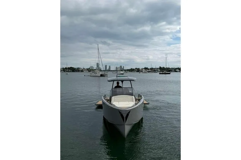 Slide: The Image of Luxury boat interior with kitchenette, featuring stainless steel appliances and seating. Virtue V10, 2026 model. - 34