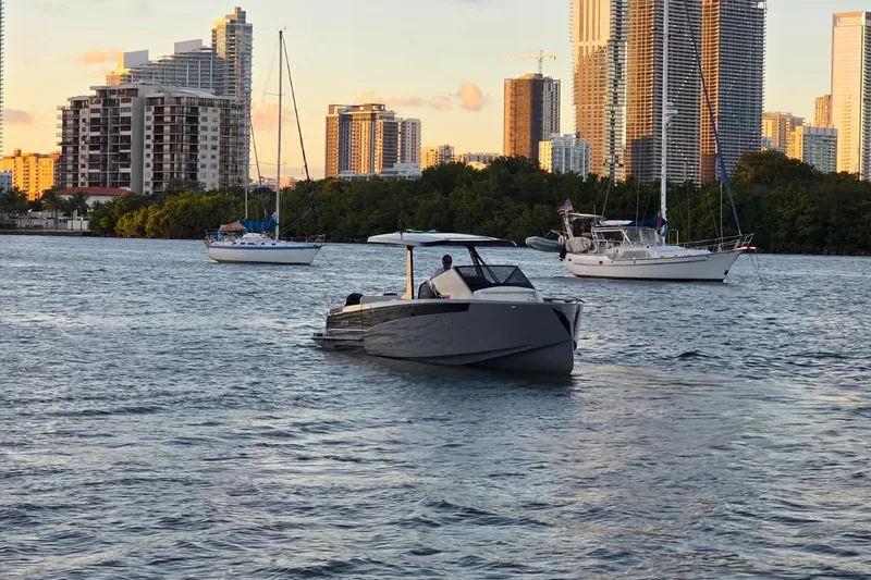 Slide: The Image of Luxurious 2026 Virtue V10 boat dashboard with sleek steering and digital displays. - 37